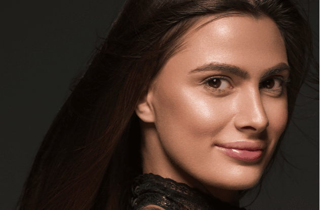 Woman with smooth, glowing skin representing results from Sylfirm X microneedling treatment in Seattle.