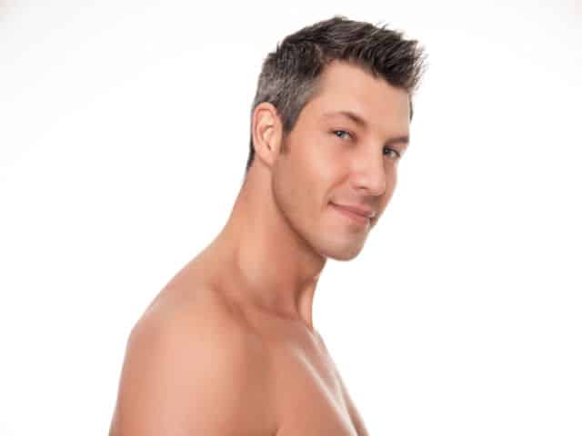 smiling shirtless man portrait